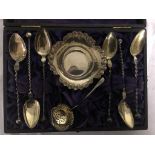 A cased silver salt strainer spoon;