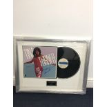 A signed Tina Turner LP 'Am I a Fool in Love': framed and glazed with CoA