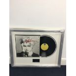 A signed Madonna LP 'Madonna': framed and glazed with CoA