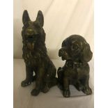 Two cast-iron metal dog figures