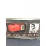 A signed Buster Douglas boxing glove: framed and glazed with CoA