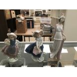 Three boxed Lladro figurines: 'Talk of the Town',