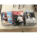 A quantity of Arsenal and West Ham programmes