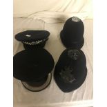 Two Metropolitan Police helmets;