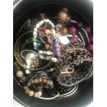 A quantity of costume jewellery to inc bangles, necklaces, rings,
