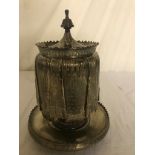 A Hallmarked silver biscuit barrel in the form of a draped barrel on pedestal,