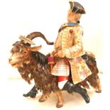 A Meissen porcelain figure of Count Bruhl's tailor riding a goat, c1880,