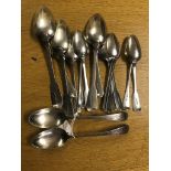 A quantity of HM silver Georgian and Victorian silver serving spoons