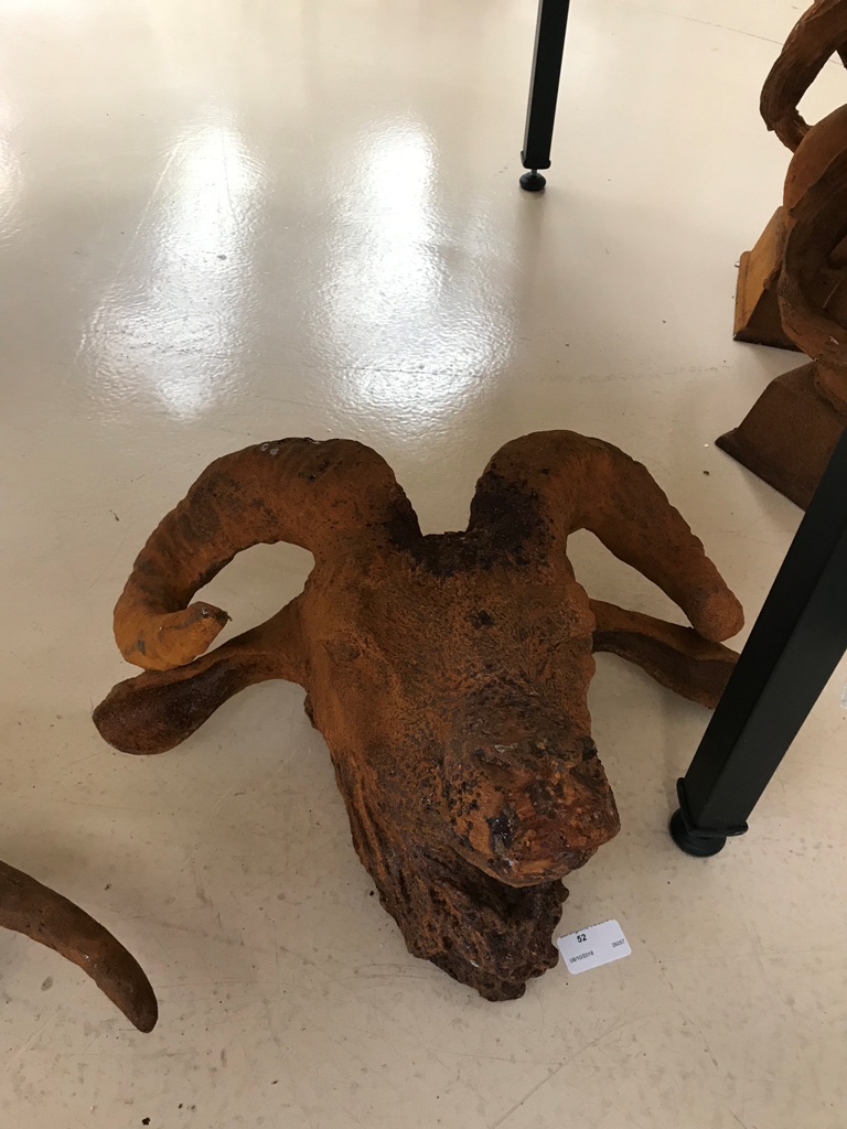 A large cast-iron ram's head