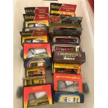 A box of boxed Dinky and Corgi diecast vehicles