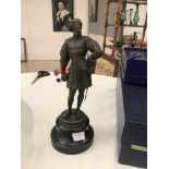 A spelter figure of a Tudor/drake