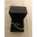 A 9ct gold mystic topaz and diamond ring