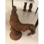 A large cast metal cockerel