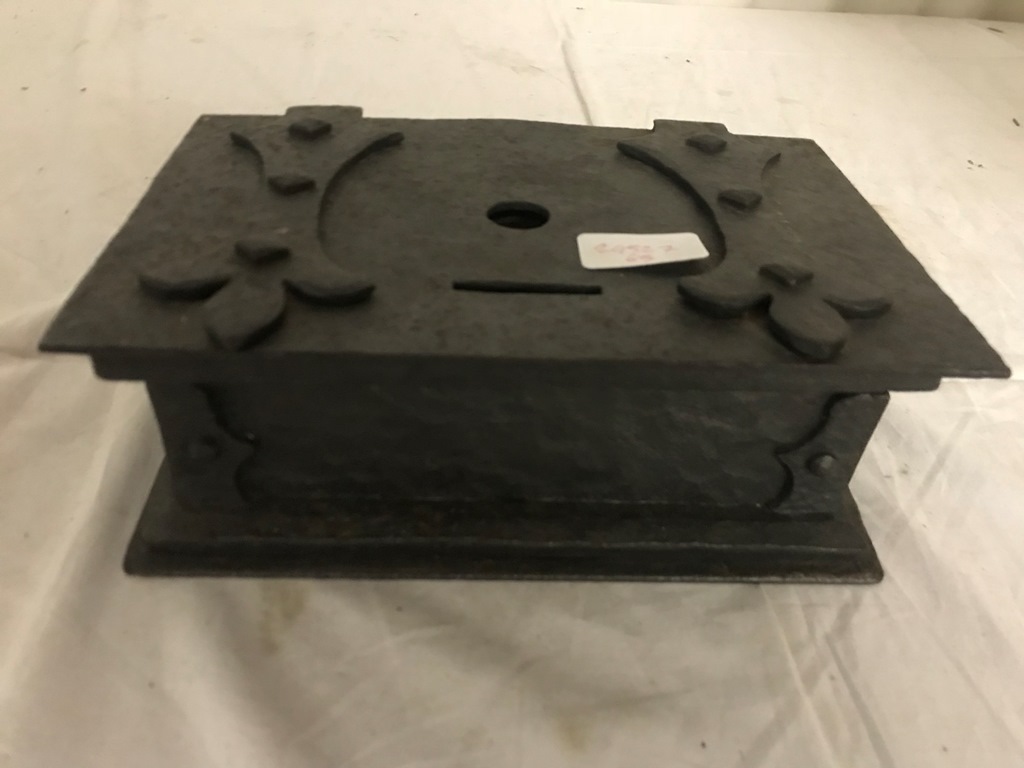 A 19th century cast-iron money box