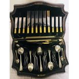 An oak-cased canteen of old English cutlery