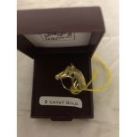 A 9ct gold horse's head brooch