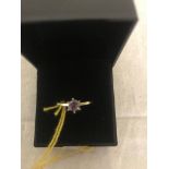 A 9ct gold natural amethyst solitaire ring