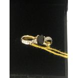 A 9ct gold natural black,