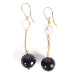 14K Black Onyx and Moonstone Earrings: Articulated drop from cabochon cut moonstone to 11mm onyx