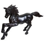 A Large Bronze of a Horse: H 87 x W 135 cm