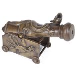 A 19th Century Bronze Cannon: The cannon with a dragon moulded in light relief,