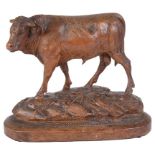 A 19th Century Carved Black Forest Cow and Bull: Crisply carved,