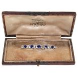 A Diamond and Sapphire Bar Brooch: Comprising old cut stones.