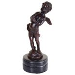 A Bronze Figure of a Cherub: Depicted beating cymbals, signed to original base,