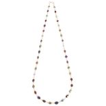 A 14K Multi-Stone Set Necklace: Set with Amethyst, Topaz, Citrine, Garnet etc, on an S-link clasp.