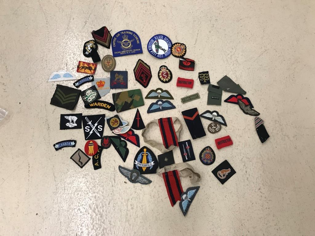 A collection of WWII and post-war military patches