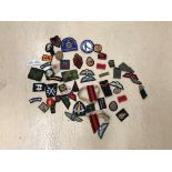 A collection of WWII and post-war military patches