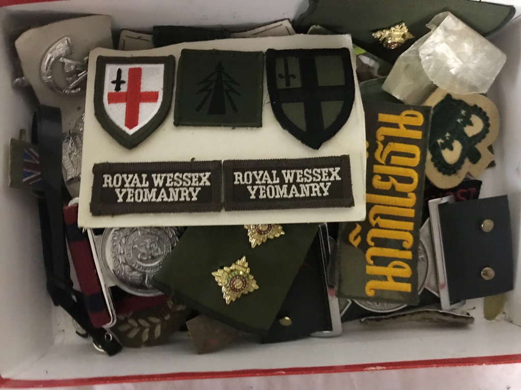 A box of military badges