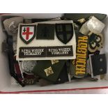 A box of military badges