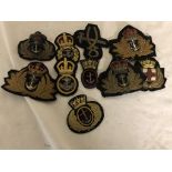 A collection of 10 bullion wired Royal Naval Officer hat badges