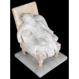 A 19th Century Marble and Alabaster Sculpture: Depicting a sleeping putti in a chair,