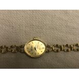 A ladies boxed 9ct watch