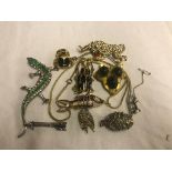 A quantity of vintage animal brooches to include insects, fish etc.