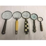 A quantity of magnifying glasses to include silver examples