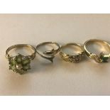 Four 9ct dress rings