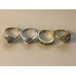 Four 9ct dress rings