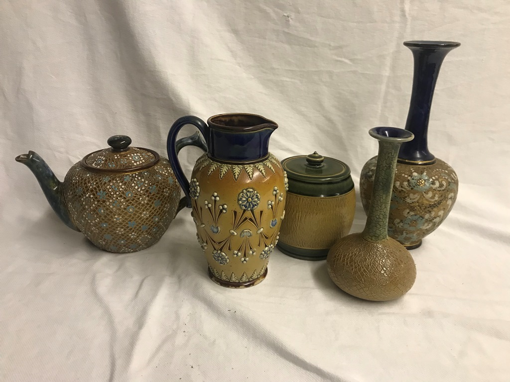 A Doulton Lambeth stoneware jug; together with a Doulton tobacco jar,