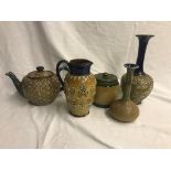 A Doulton Lambeth stoneware jug; together with a Doulton tobacco jar,