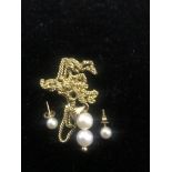 A 9ct pearl pendant and earrings