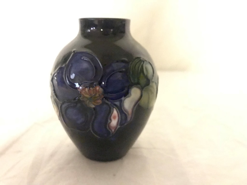 A miniature Moorcroft vase,