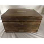 A 19th century mahogany vanity box with fitted silver plated lidded jars