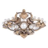 A 19th Century Scandinavian Gold and Pearl Brooch: Set with 13 pearls to the floral scrollwork