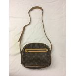 A Louis Vuitton shoulder bag in monogram pattern;