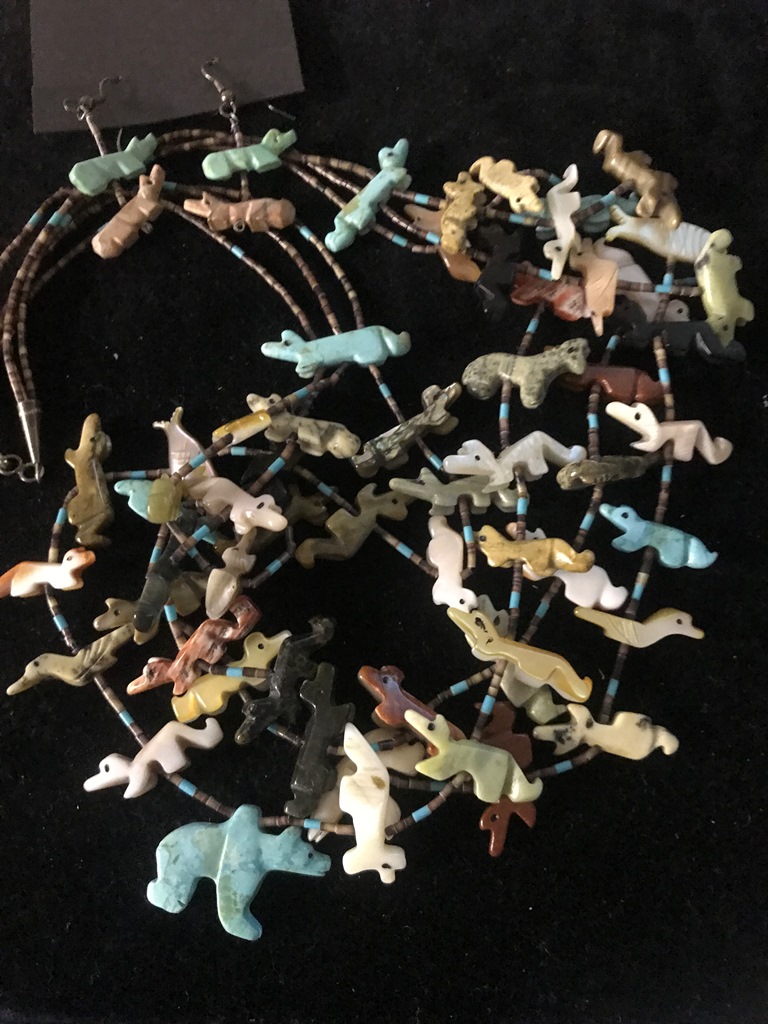 A native American hardstone animal necklace and earrings