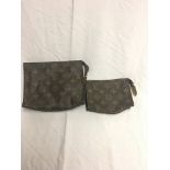 Two Louis Vuitton zip purses in monogram pattern,