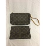 Two Louis Vuitton clucth bags in monogram pattern;